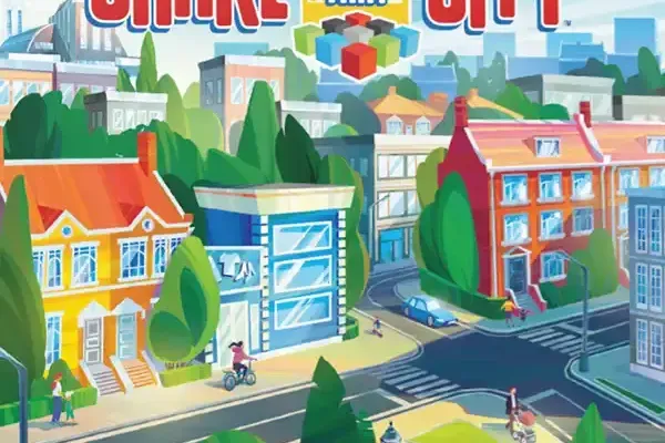 Cover „Shake that City“: sonnige, bunte Stadt mit Häusern und Bäumen, oben roter Titel mit bunten Würfeln.